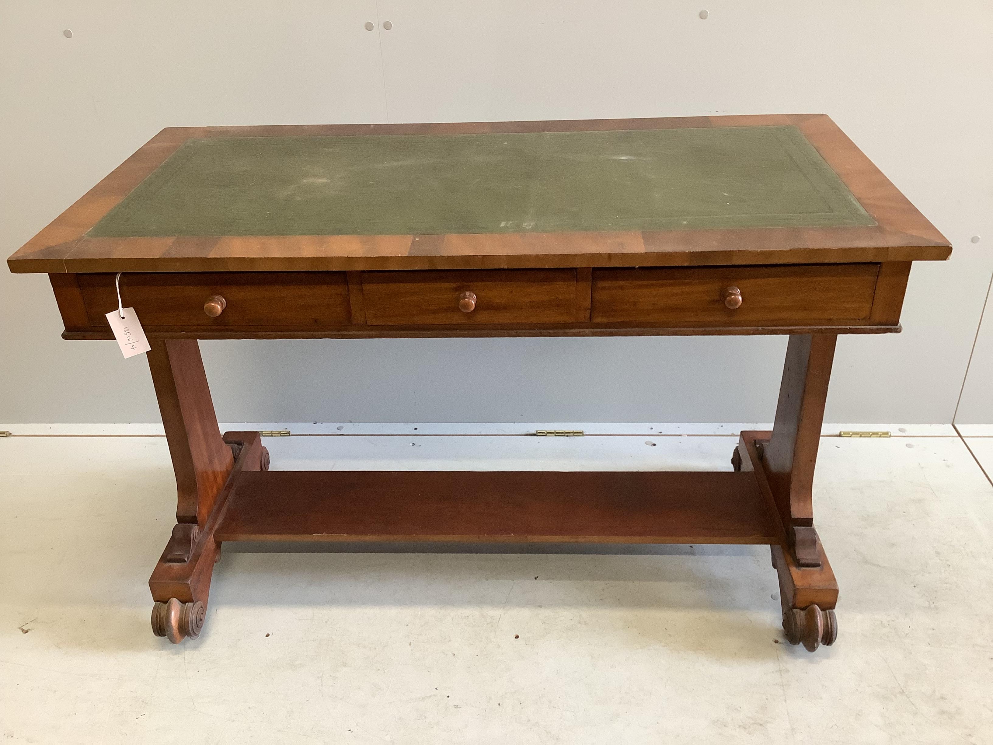 A Victorian rectangular mahogany two drawer writing table, with leather inset top, width 116cm, depth 57cm, height 76cm